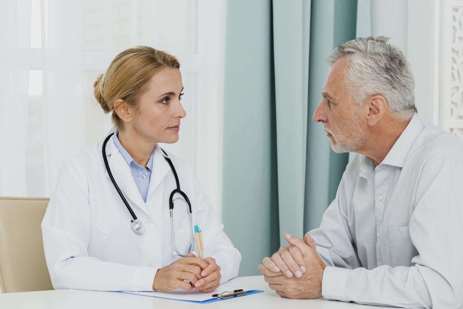 Doctor speaking with a patient during a consultation